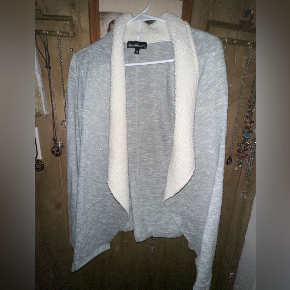 Asymmetrical sweater.